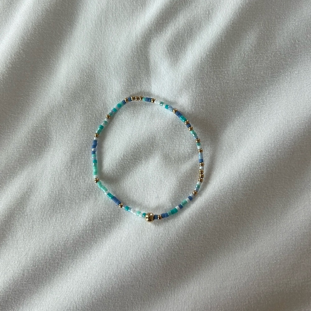 Blue and gold enewton bracelet. on the smaller size but in perfect condition!